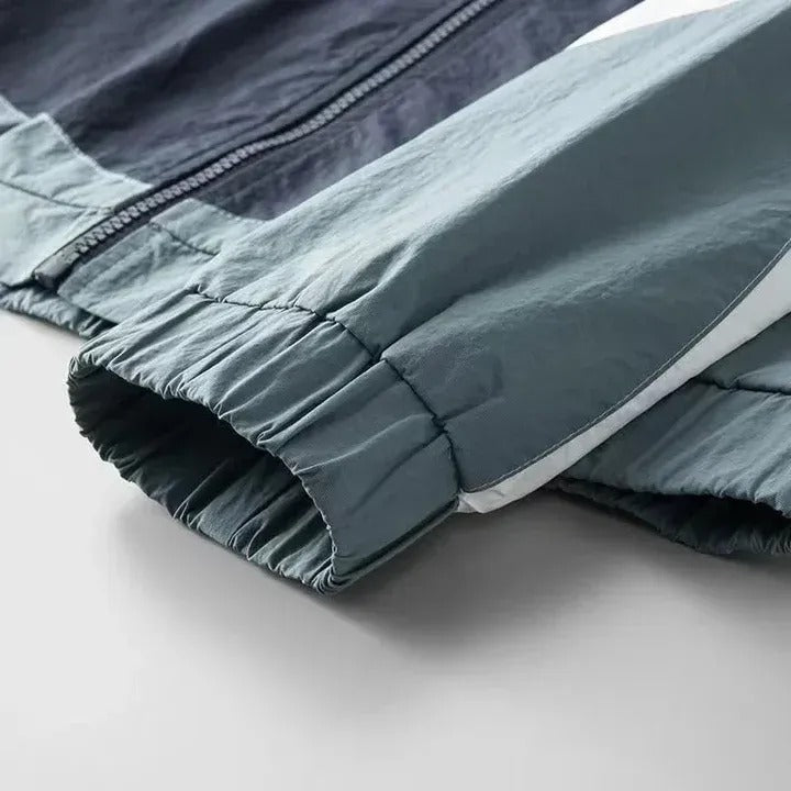 UA™ Men’s Hooded Windbreaker Jacket